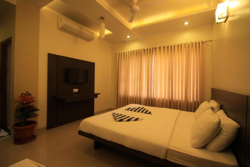 Hotel Sai Smaran เชอร์ดี ห้อง รูปภาพ