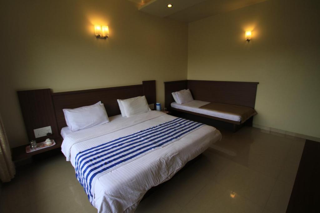 Hotel Sai Smaran เชอร์ดี ห้อง รูปภาพ