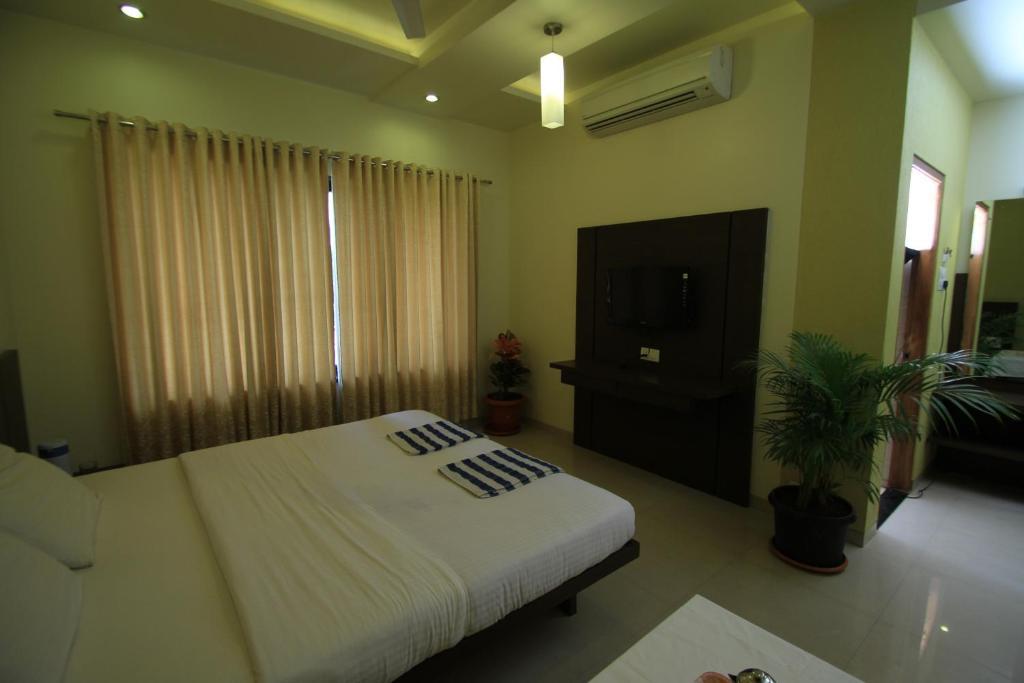 Hotel Sai Smaran เชอร์ดี ห้อง รูปภาพ